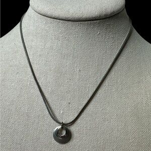 Silvertone Lia Sophia Necklace with circular pendant. (F-O)